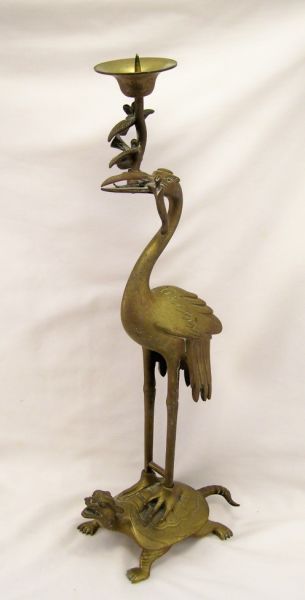 Appraisal: Brass Oriental Figural Candleholder Figure depicts a standing crane on