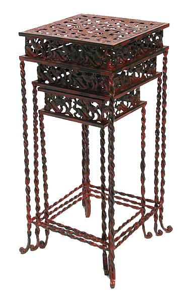 Appraisal: A set of three wrought iron paint decorated nesting tables