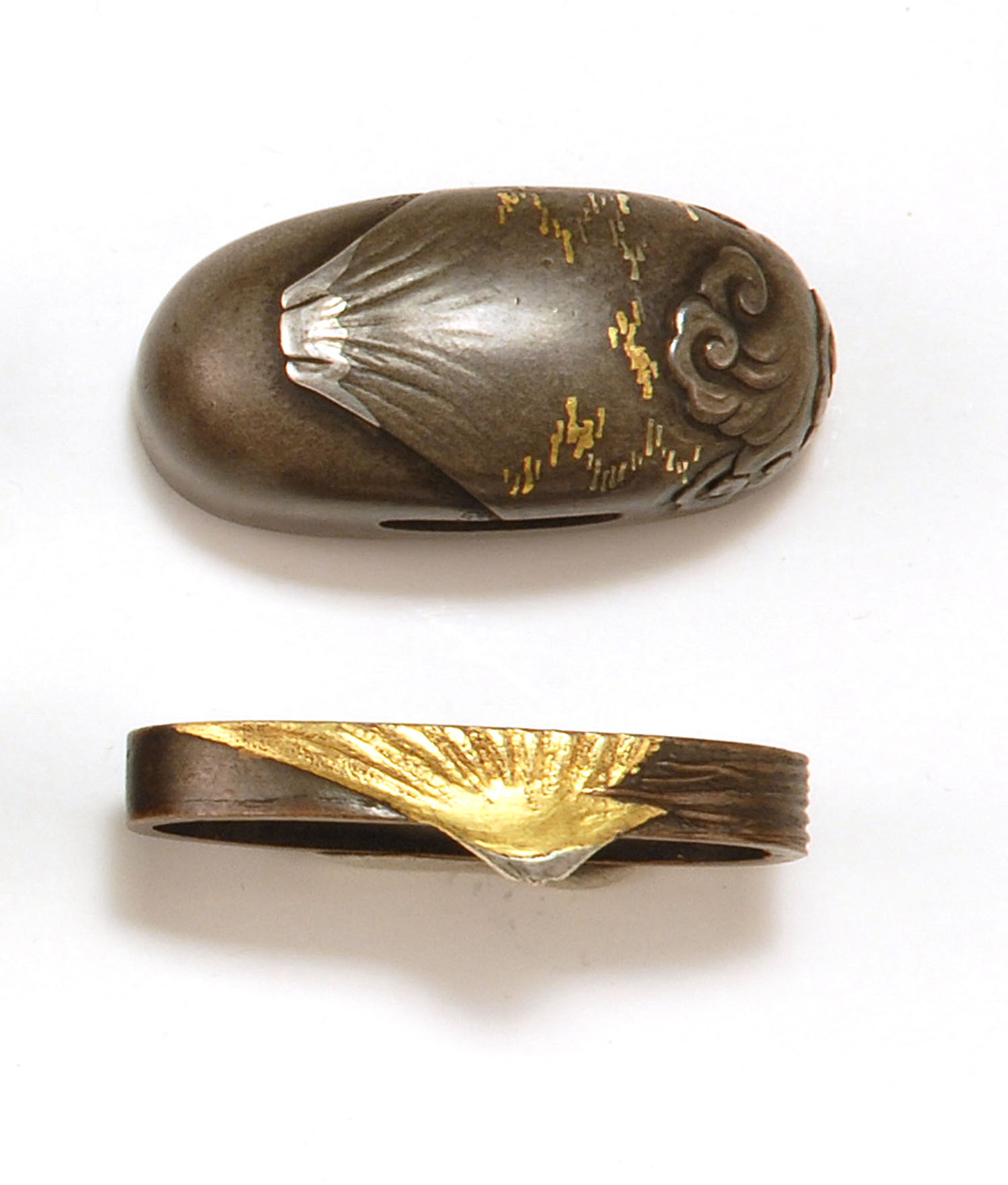 Appraisal: PAIR OF SENTOKU FUCHI KASHIRA th CenturyBy Yasuchika With gold