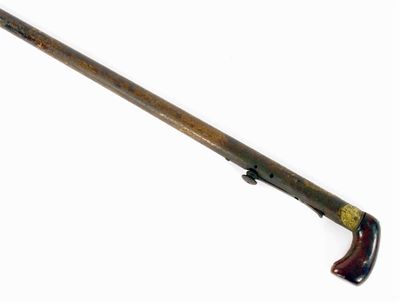 Appraisal: An under hammer mussel loading walking stick gun the simulated