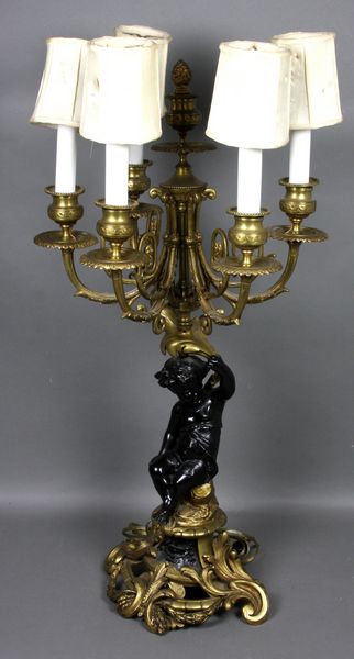 Appraisal: th Century French cast bronze dore candelabrum converted to a