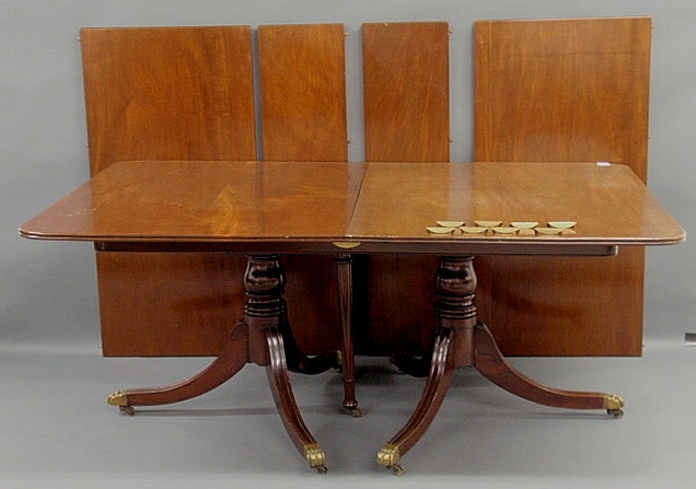 Appraisal: Mahogany Duncan Phyfe style banquet table with a double pedestal