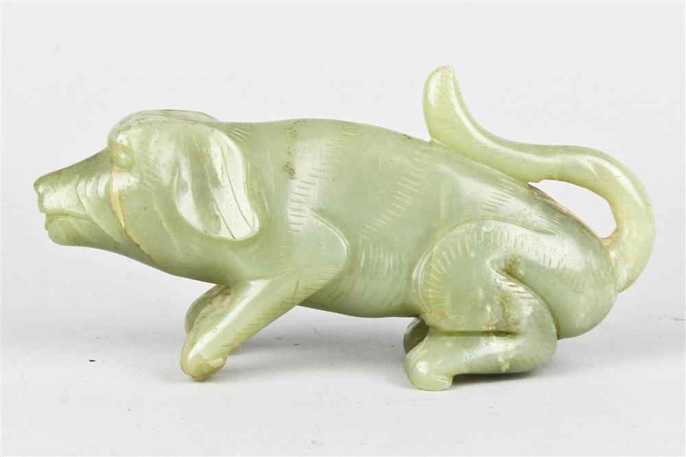 Appraisal: CHINESE GREENISH-GRAY JADE CARVING OF A HOUND the beast seated