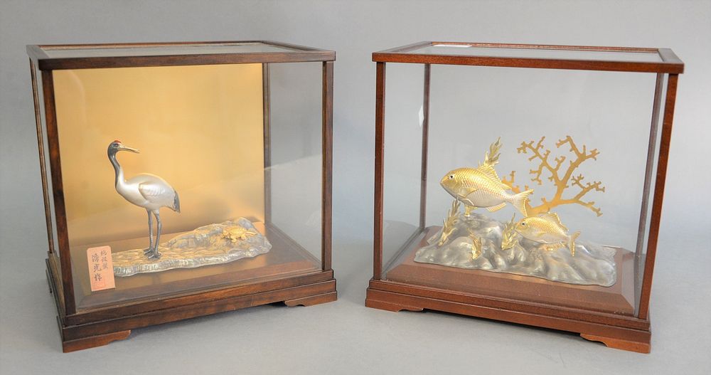 Appraisal: Two Japanese silver pieces in glass cases fish with coral