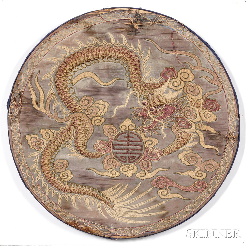 Appraisal: Embroidered Dragon Roundel China depicting a dragon coiled around a