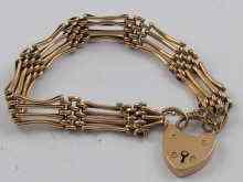 Appraisal: A ct gold gate bracelet with padlock clasp approx cm