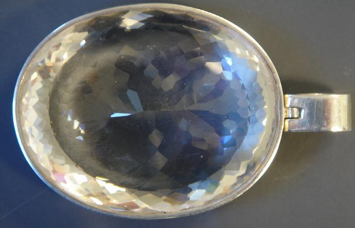 Appraisal: Quartz Crystal Pendant Large oval cut quartz crystal in an