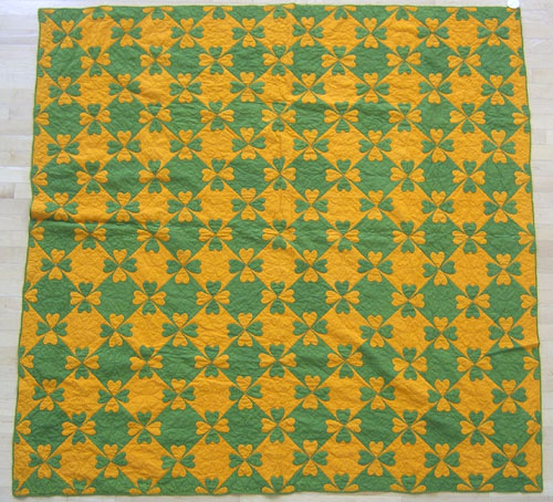 Appraisal: Green and orange pieced heart in diamond quilt x