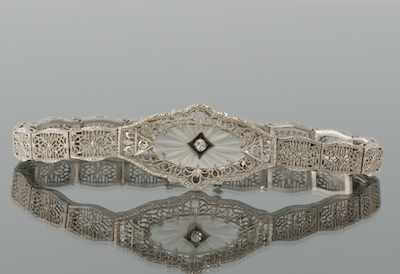 Appraisal: An Art Deco Gold Diamond and Camphor Glass Bracelet k