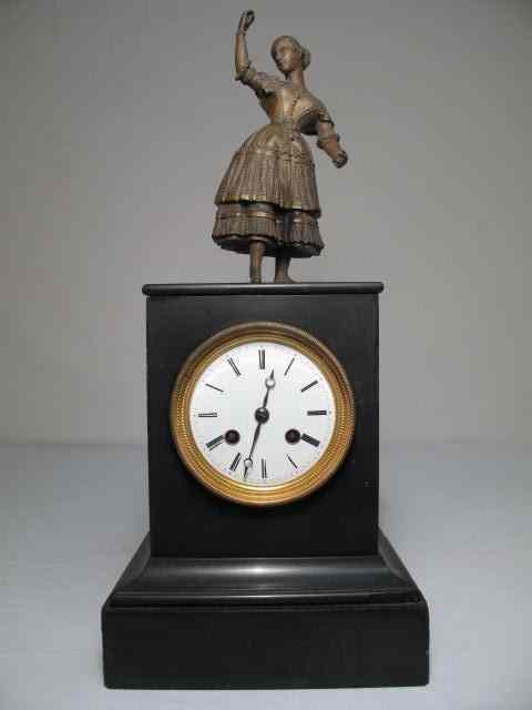 Appraisal: Antique Bronze and black marble mantle clock with bronze figure