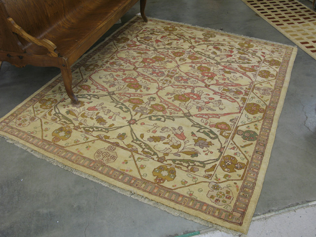 Appraisal: HAND KNOTTED ORIENTAL CARPET Pakistani Zeigler overall floral tracery on