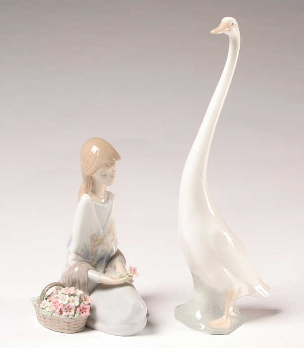 Appraisal: Two Lladro figures elongated goose and seated flower girl Tallest