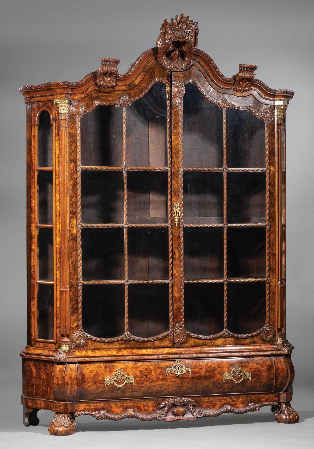 Appraisal: Antique Dutch Carved and Bronze-Mounted Walnut Bookcase shaped cornice centered