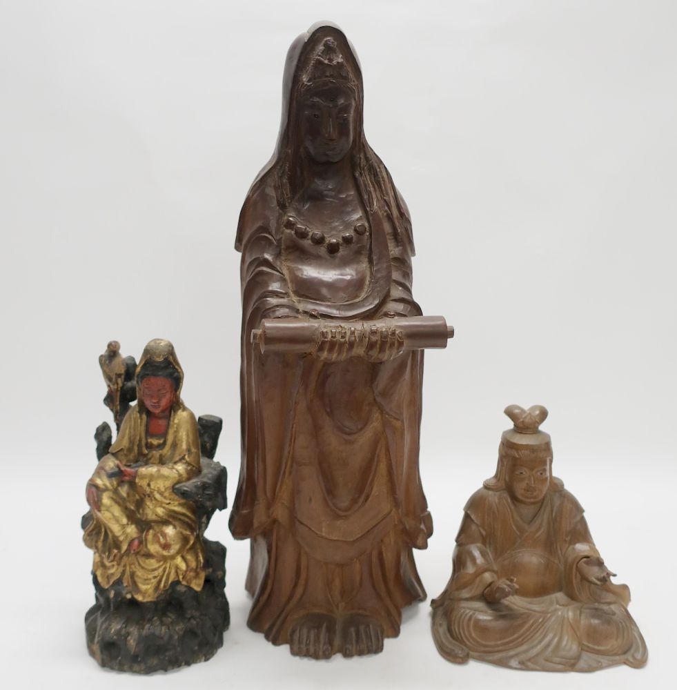 Appraisal: Asian Figures Carved wood or gilded and ploychromed seated standing