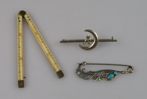 Appraisal: Two white metal bar brooches one with crescent and imp