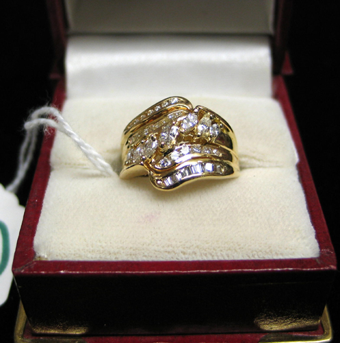 Appraisal: DIAMOND AND FOURTEEN KARAT GOLD RING set with a cluster