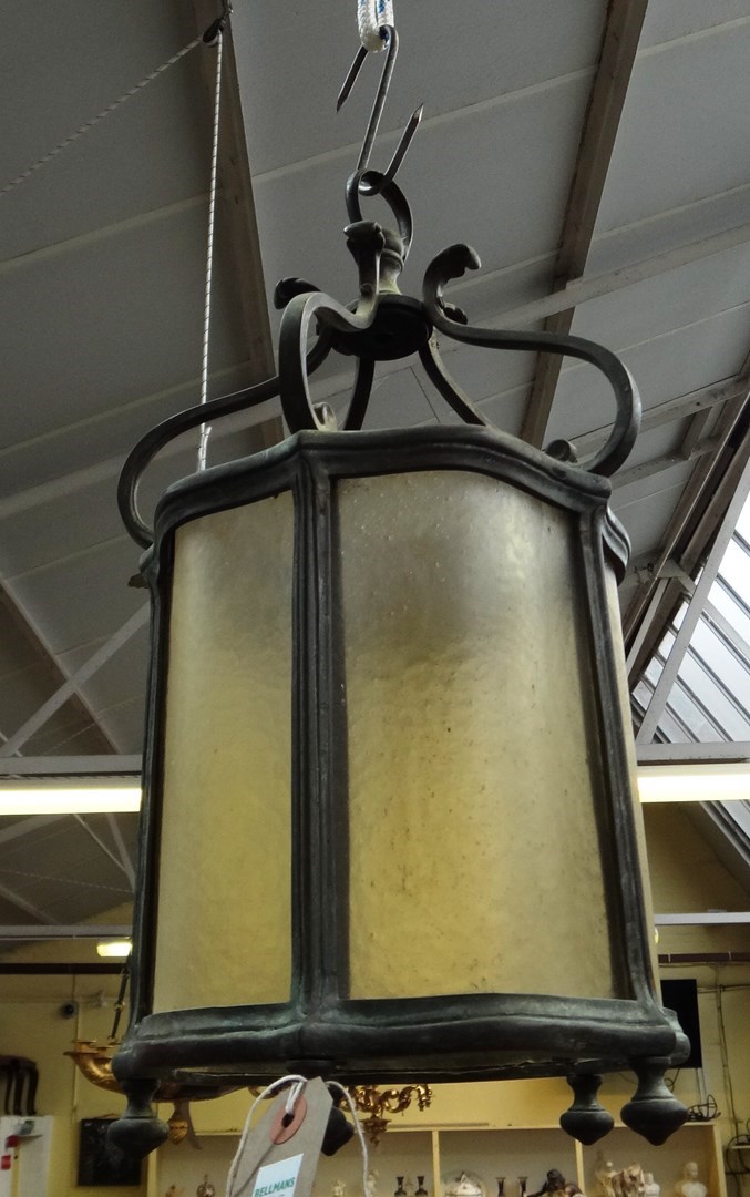 Appraisal: A bronze and glass hall lantern th century of shaped