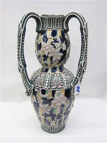 Appraisal: JAPANESE MORIAGE POTTERY TRI-HANDLED VASE The cobalt blue field with