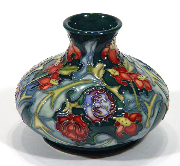 Appraisal: Moorcroft squat pottery vase hand painted and tubelined with Leicester