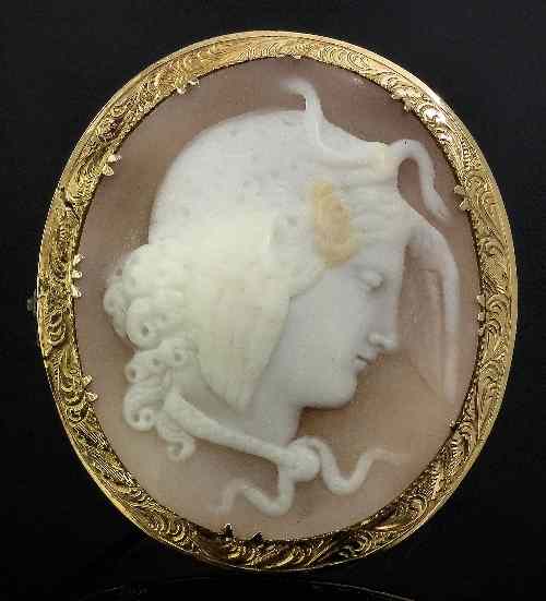 Appraisal: A late Victorian gold coloured metal mounted oval cameo brooch