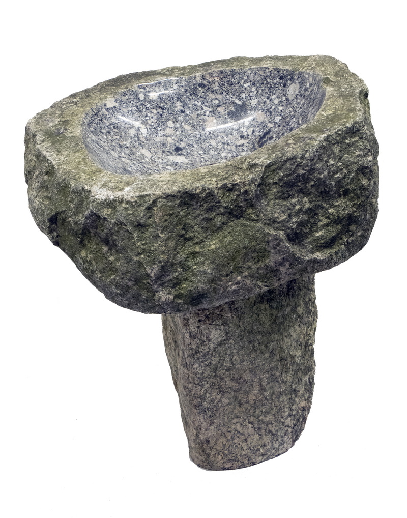 Appraisal: TWO-PART GRANITE BIRD BATH Rough hewn stone with a rounded