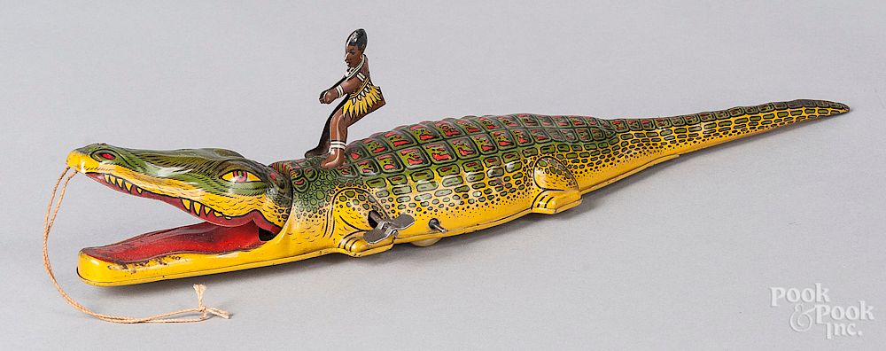 Appraisal: Tin litho windup Black Americana alligator toy Tin litho windup