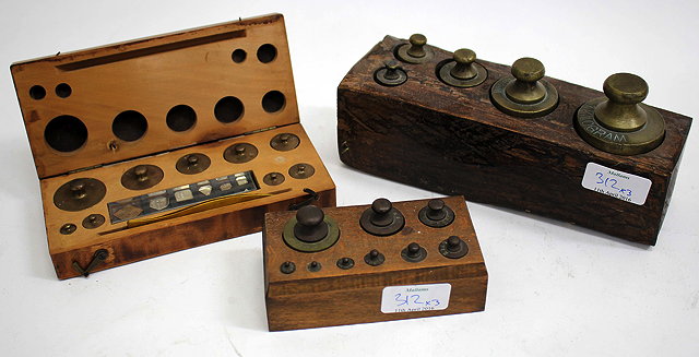 Appraisal: A SET OF APOTHERCARY GRAM WEIGHTS in hardwood case going