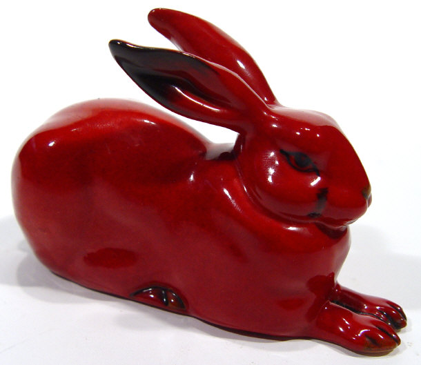 Appraisal: Royal Doulton red flamb glazed rabbit commemorating the centenary factory