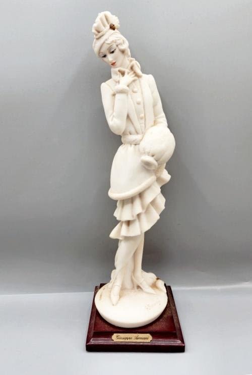 Appraisal: Giuseppe Armani Figurine on wood base inches tall Damina con