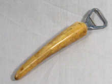 Appraisal: A crown cork bottle opener marked ' Asprey ' with