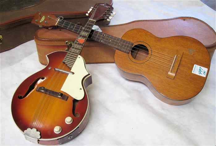 Appraisal: TWO STRINGED MUSICAL INSTRUMENTS a Kay mandolin with inset mother