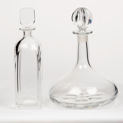 Appraisal: Two Orrefors glass decanters one of square form with flattened