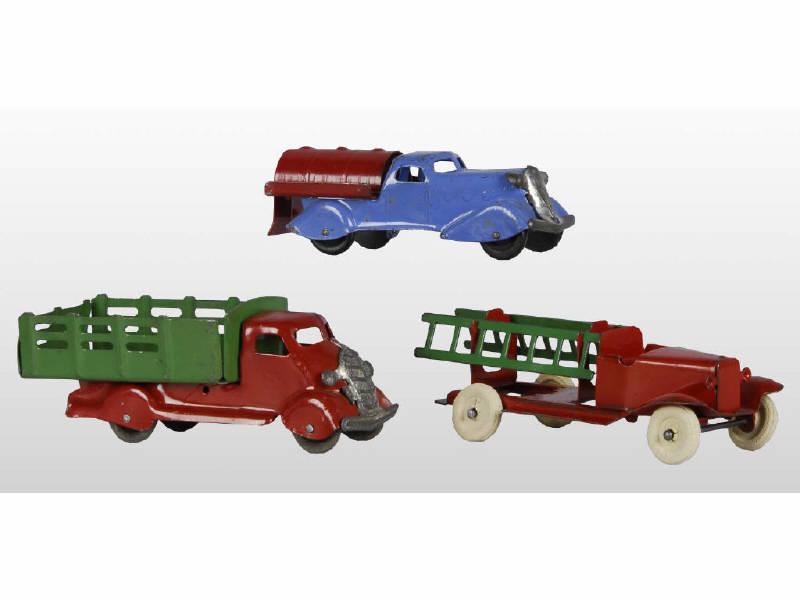 Appraisal: Lot of Pressed Steel Work Toy Trucks Description Two Wyandotte