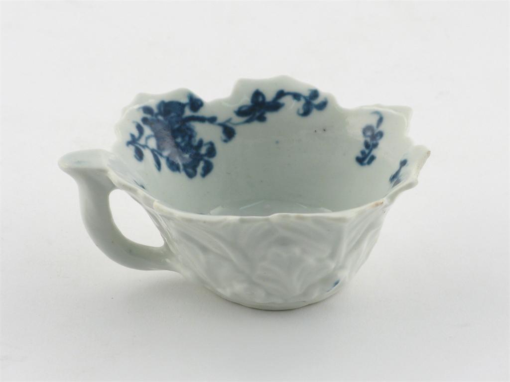 Appraisal: A Worcester blue and white moulded butterboat