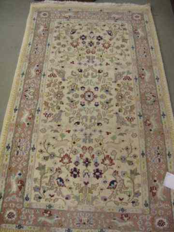 Appraisal: Kerman Persian Handmade Rug animals florals on ivory peach trim