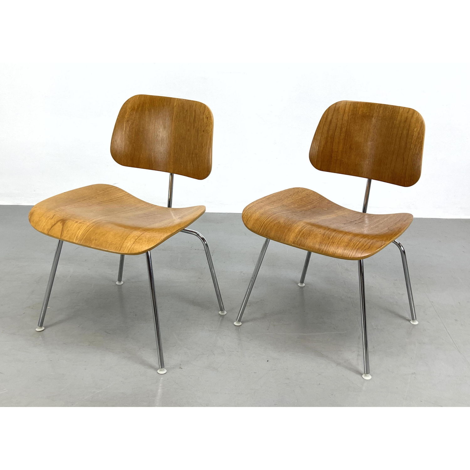 Appraisal: Pair Charles Eames Herman Miller DCM Chairs Dimensions H inches