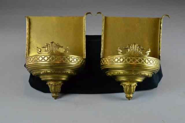 Appraisal: BRASS WALL SCONCESA pair of decorative brass wall sconces with