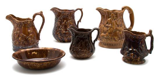 Appraisal: A Collection of Bennington Pottery comprising five pitchers and a