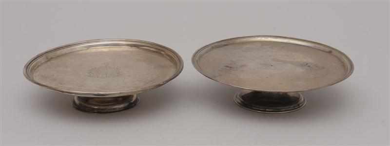 Appraisal: TWO SIMILAR IRISH CRESTED OR ARMORIAL SILVER WAITERS ON LATER