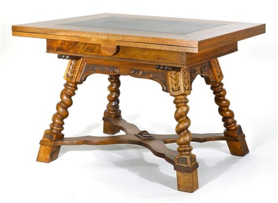 Appraisal: A SLATE-TOP EXTENDING TABLE Renaissance style th c Walnut carved