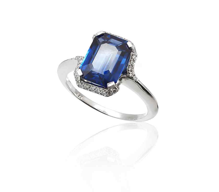 Appraisal: K EMERALD CUT BLUE SAPPHIRE RING K white gold ring