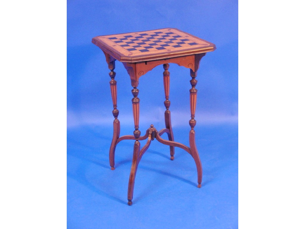 Appraisal: An Edwardian games table with chequer board parquetry birds eye