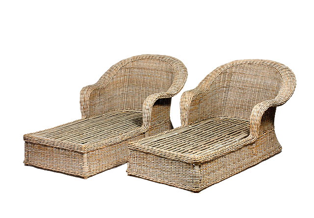 Appraisal: A PAIR OF LARGE EARLY TH CENTURY WICKER LOUNGER CHAIRS