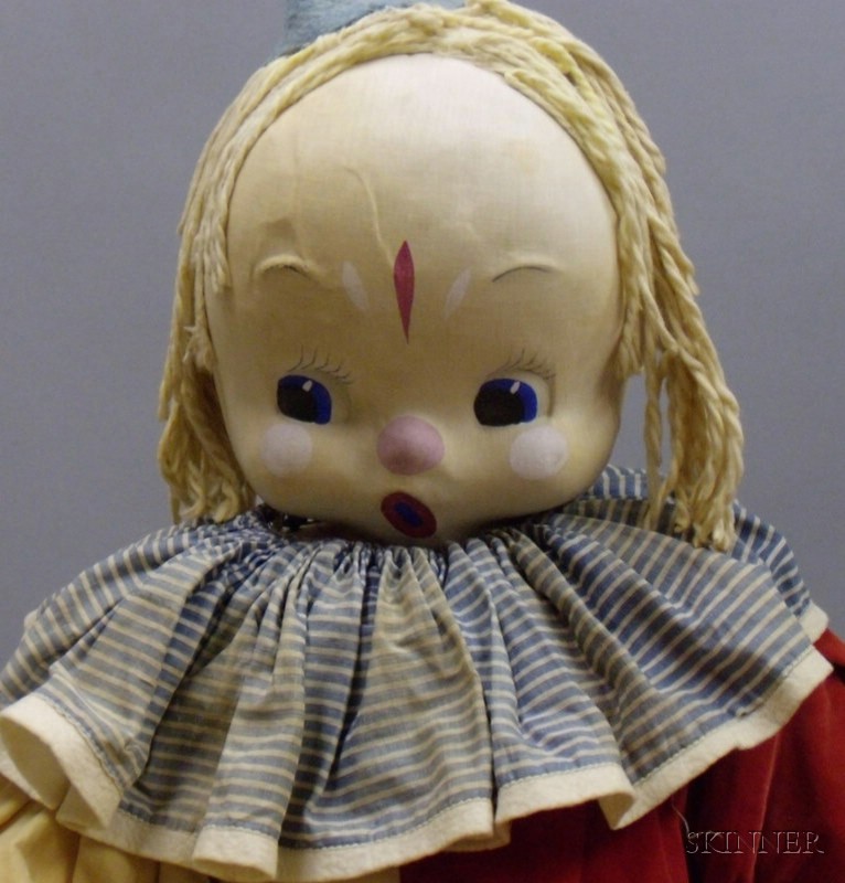 Appraisal: Large Cloth Clown Doll c s with pressed cloth face