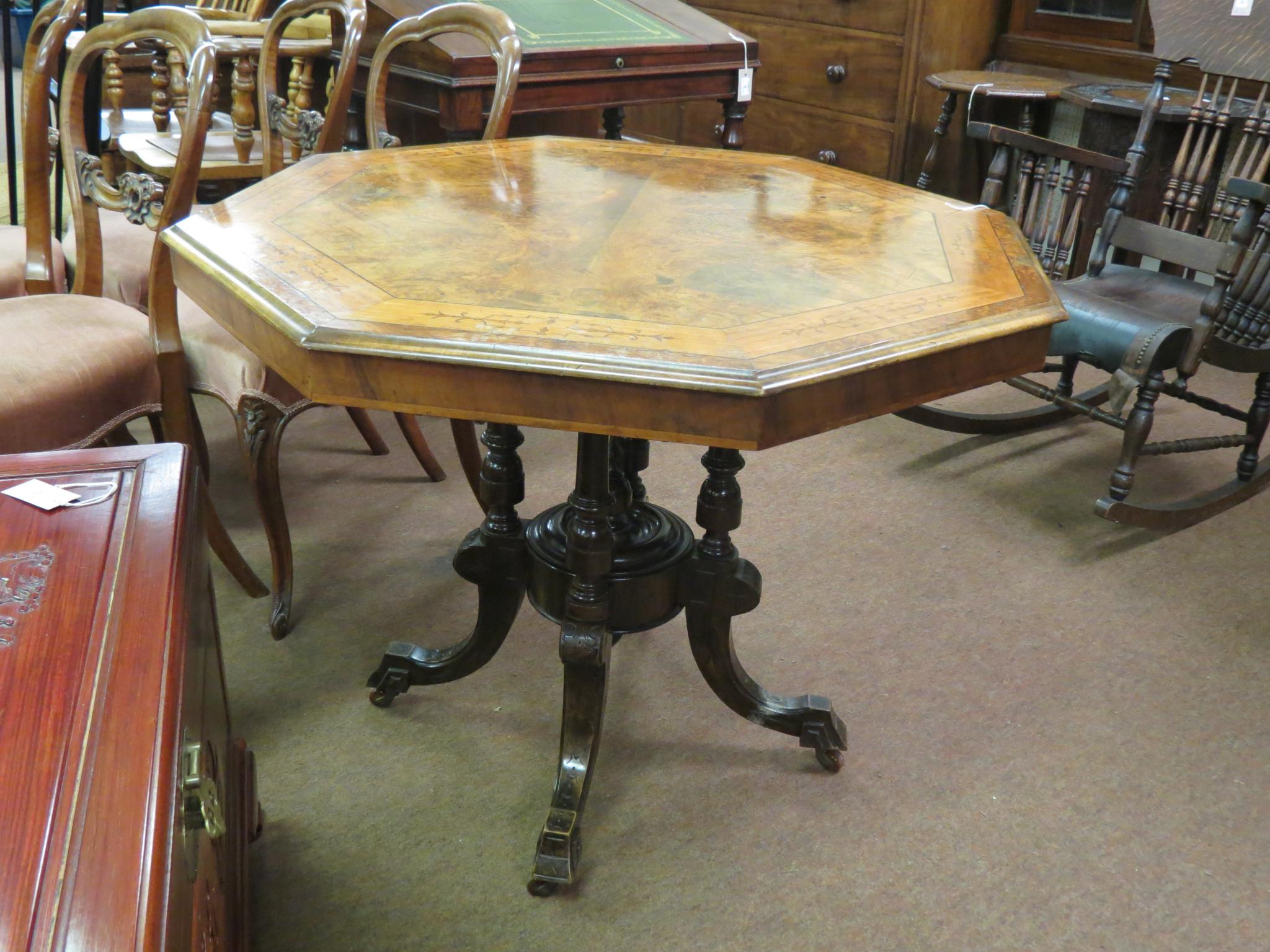 Appraisal: A Victorian octagonal walnut centre table burr-veneered top inlaid with