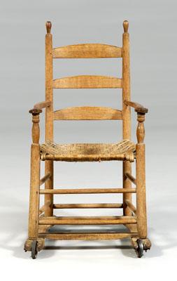 Appraisal: Early Georgia quot wheelchair quot invalid s chair with three-slat