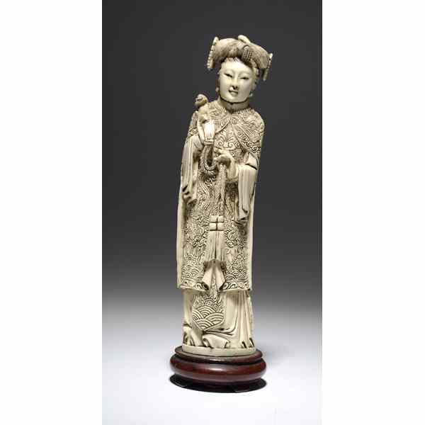 Appraisal: Chinese Carved and Inked Figurine Chinese th century Carved resin