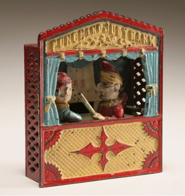 Appraisal: Punch and Judy cast iron mechanical bank raised Shepard Hardware