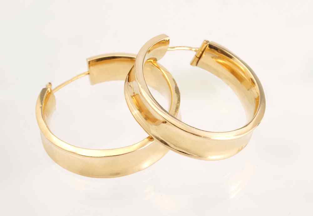 Appraisal: THE ULTIMATE GOLD HOOP EARRINGS K yellow gold hollow hoop