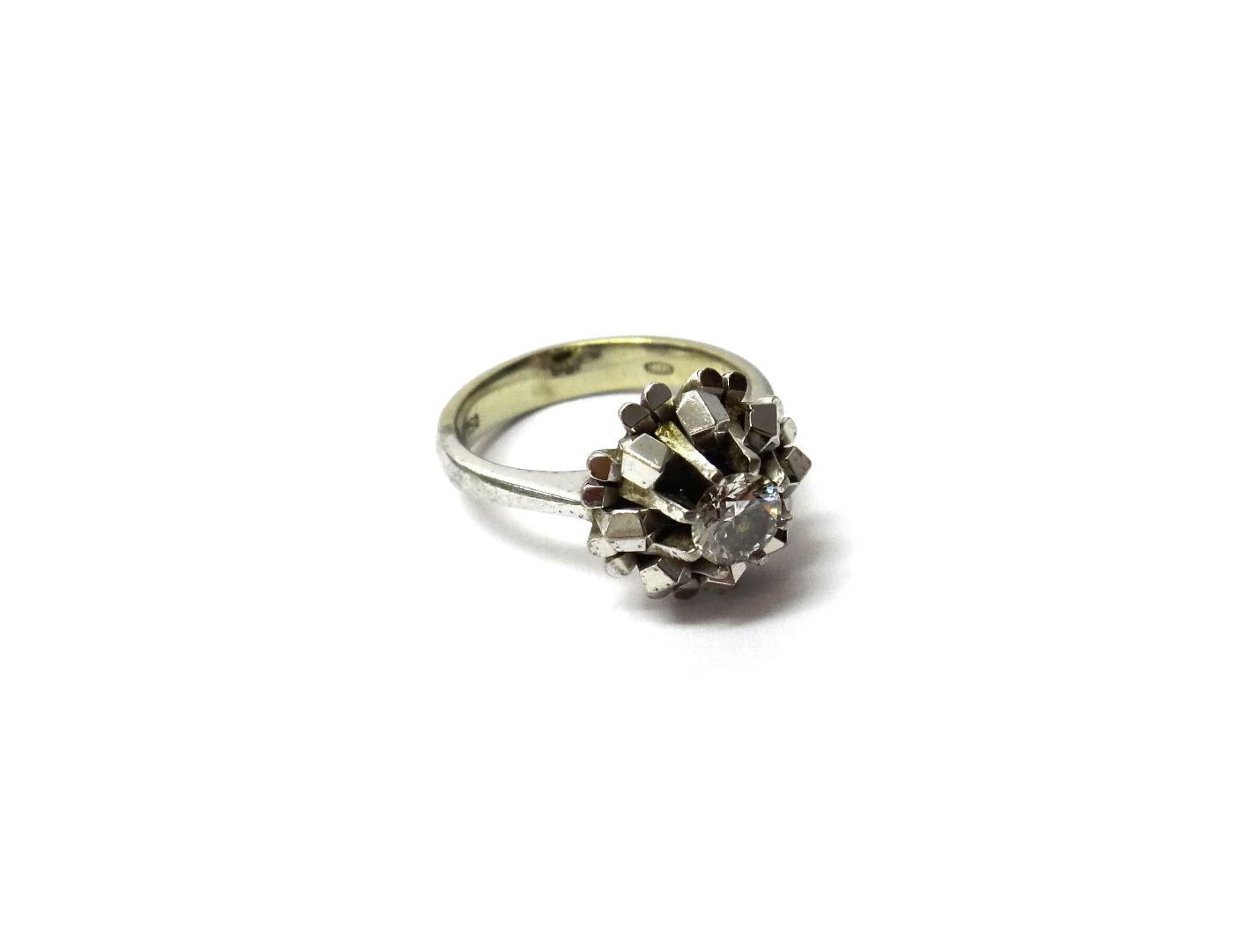 Appraisal: A white gold and diamond set single stone ring claw